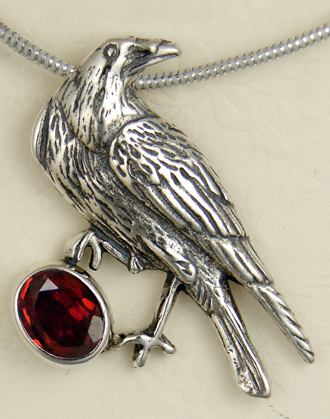 Sterling Silver Raven Pendant With Garnet